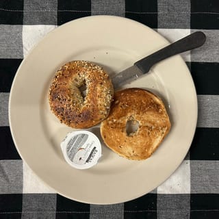 Cinnamon Raisin Bagel Toasted With Cream Cheese (Side)