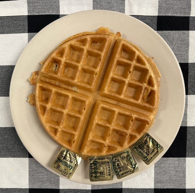 Belgian Waffle with Butter & Syrup.